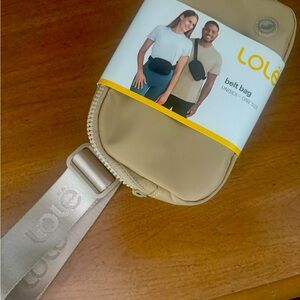 Lolë brand unisex Tan Belt Bag NWT